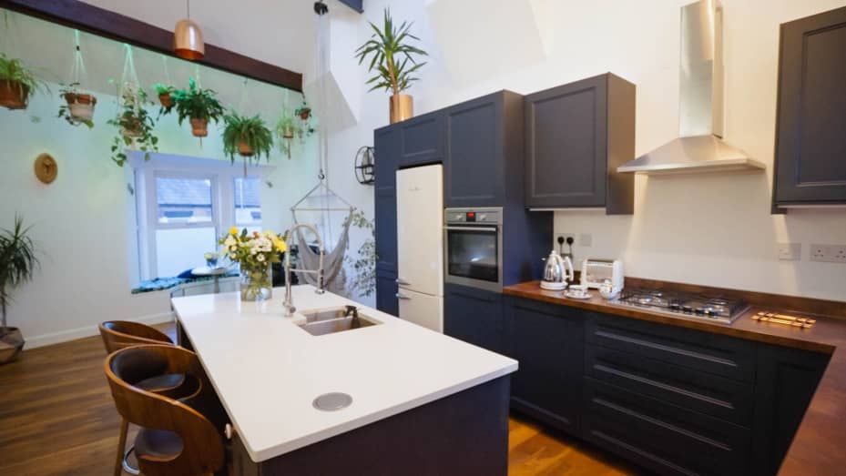 The kitchen island, which I bought used, gives me plenty of space to cook and entertain.